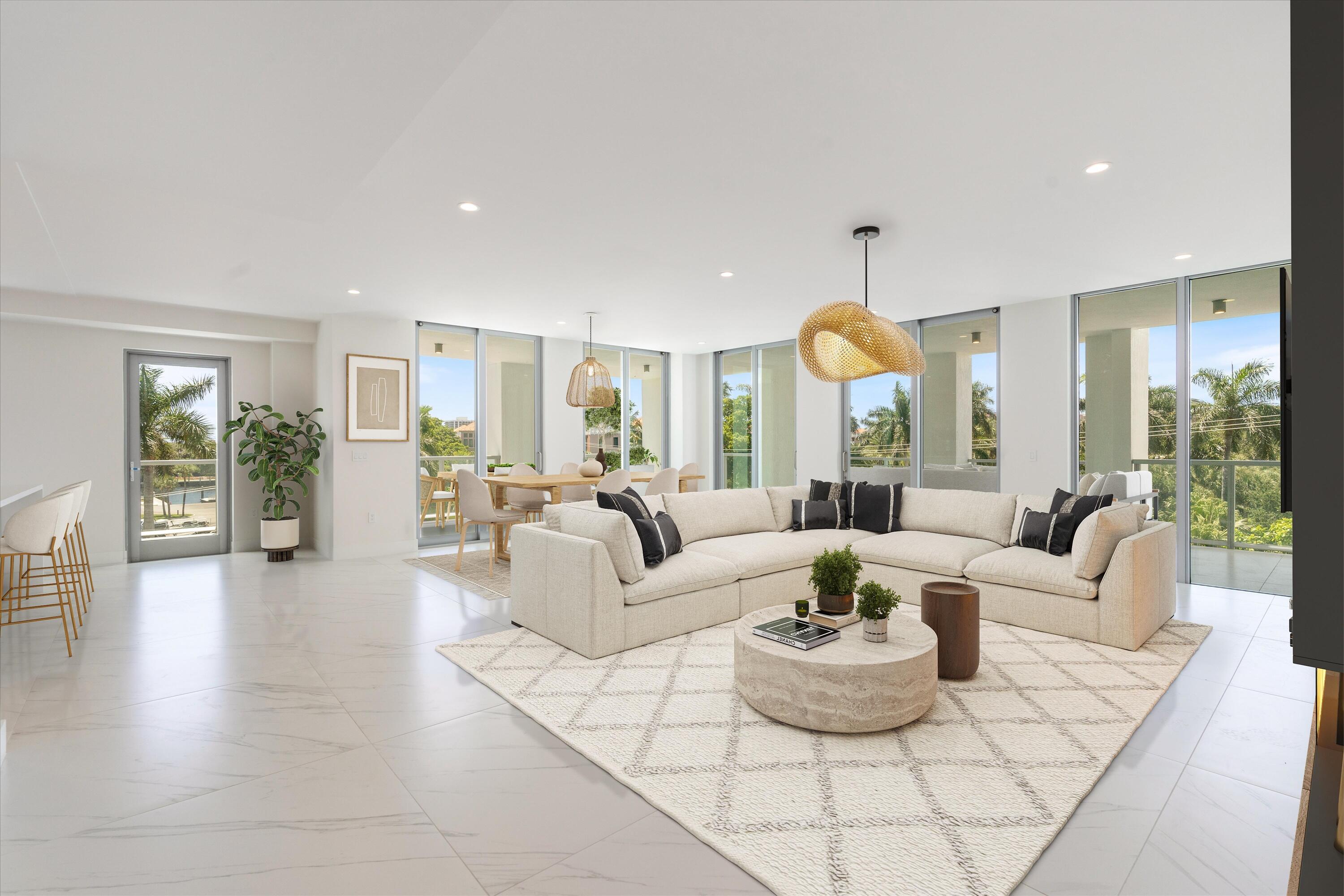 495 East Royal Palm Road, Unit 402 Boca Raton, FL 33432 - Photo 8 of 72 a living room with fireplace furniture and a large window