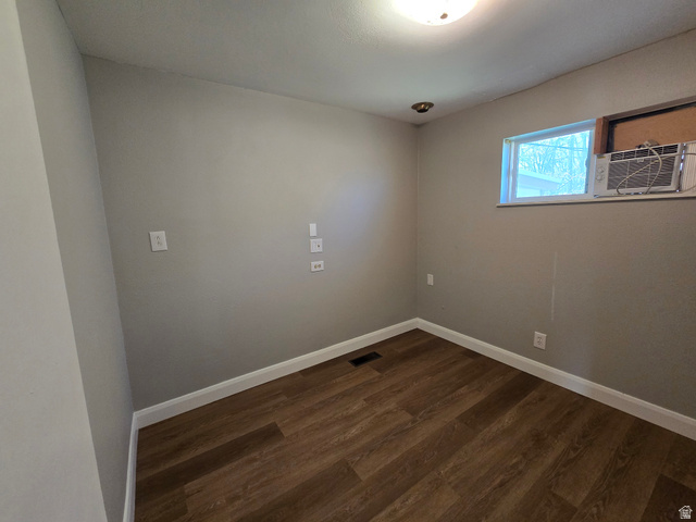 490 Averett Avenue, Unit 1 Springville, UT 84663 - Photo 7 of 11 Empty room featuring dark wood finished floors