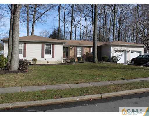 295 Marshall Road North Brunswick, NJ 08902 - Photo 1 of 19 a front view of a house with a yard
