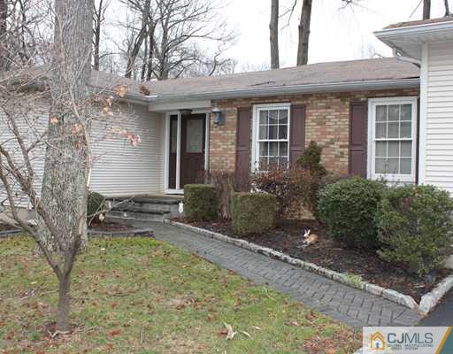 295 Marshall Road North Brunswick, NJ 08902 - Photo 2 of 19 front view of a house with a yard