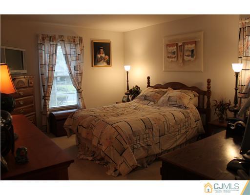 295 Marshall Road North Brunswick, NJ 08902 - Photo 13 of 19 a bed room with a bed
