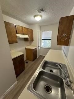 1870 King David Drive, Unit 206 Three Rivers, TX 78071 - Photo 2 of 5 a utility room with sink dryer and washer