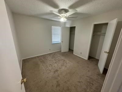 1870 King David Drive, Unit 206 Three Rivers, TX 78071 - Photo 5 of 5 an empty room with windows and fan