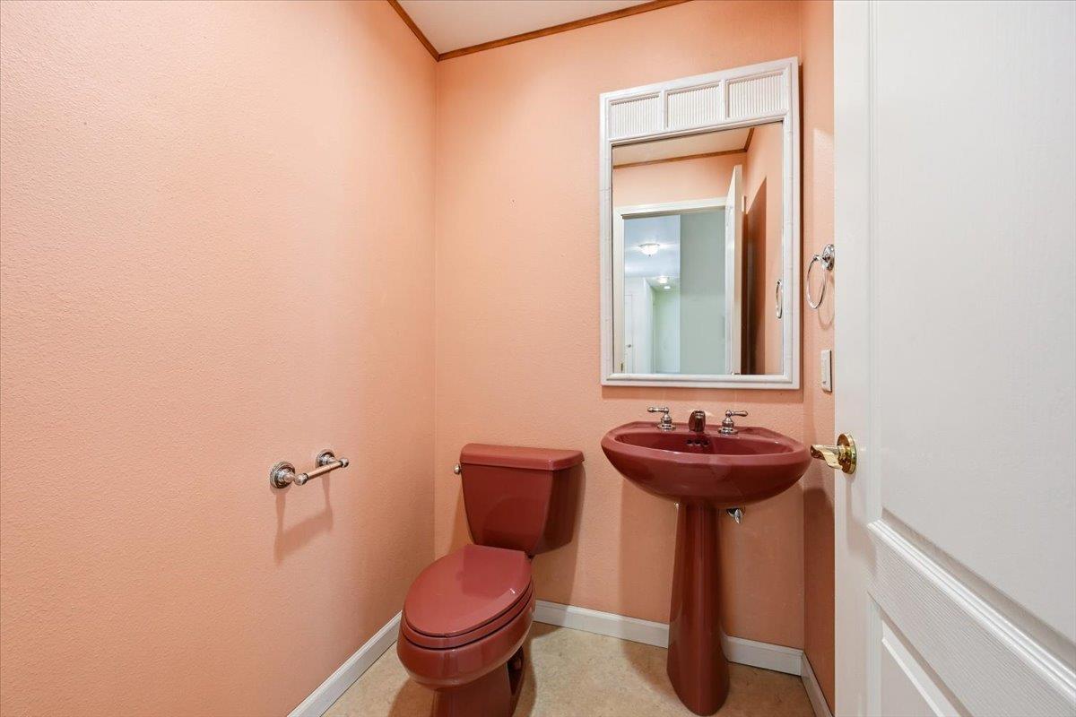 12600 Friar Tuck Road Grass Valley, CA 95949 - Photo 23 of 56 a bathroom with a sink and a toilet