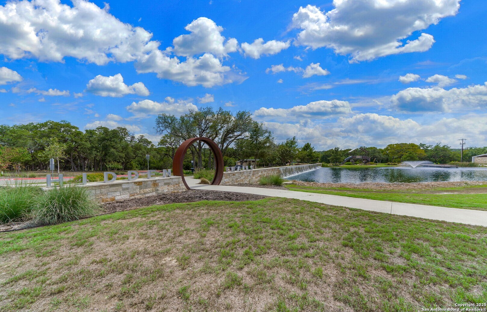 5359 Forbs Lane Bulverde, TX 78163 - Photo 16 of 21 a view of a lake with a yard