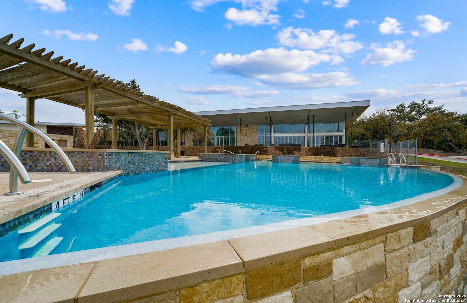 5359 Forbs Lane Bulverde, TX 78163 - Photo 18 of 21 a view of a swimming pool with a patio