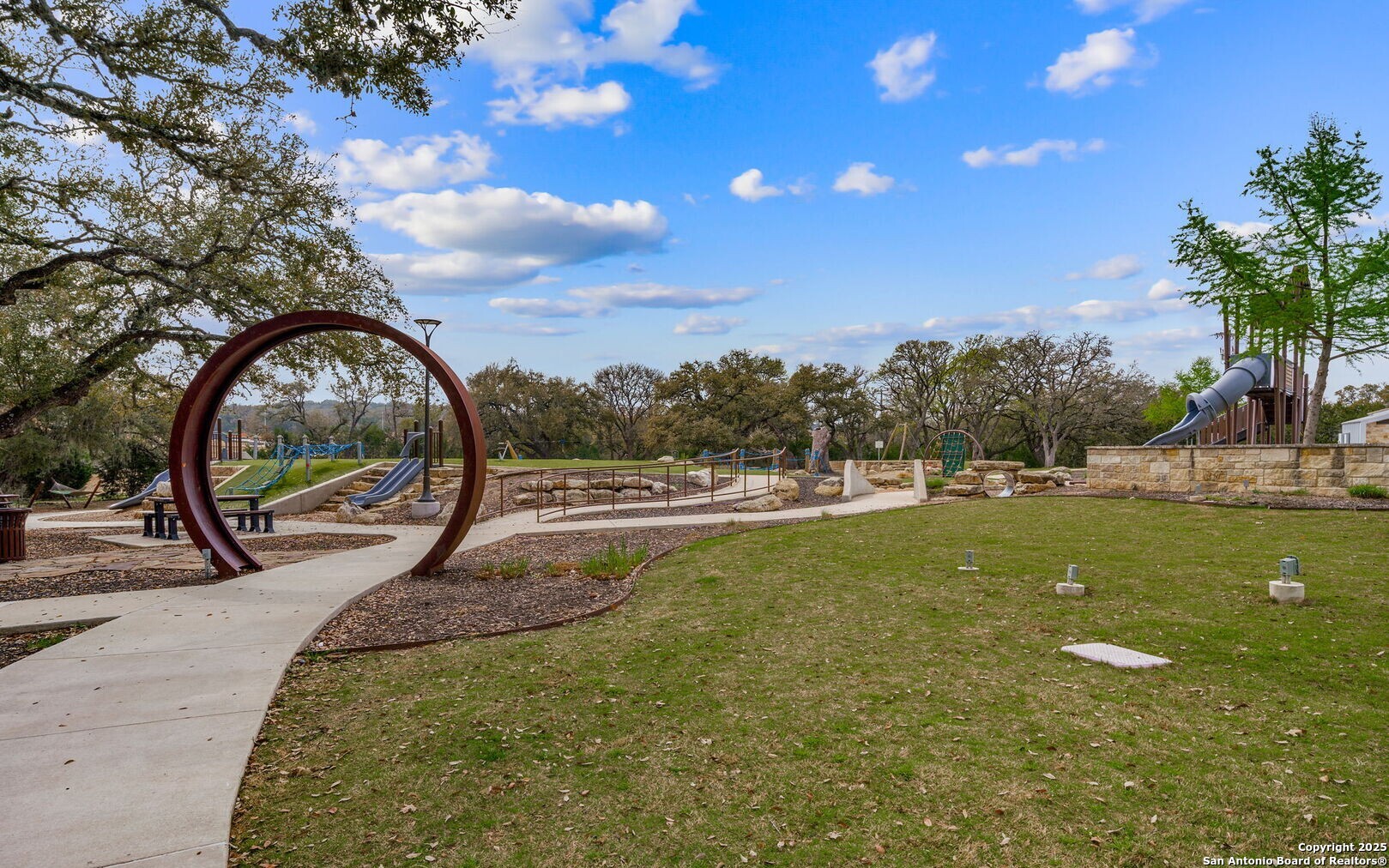 5359 Forbs Lane Bulverde, TX 78163 - Photo 20 of 21 a view of swimming pool with a garden