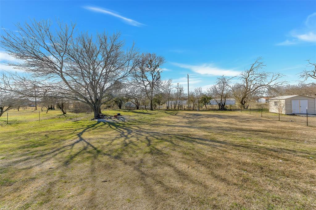 203 North Church Street Blue Ridge, TX 75424 - Photo 16 of 18 a view of a yard with swimming pool