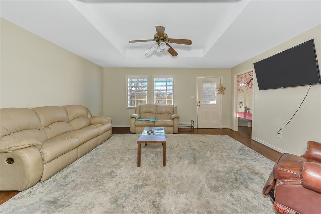203 North Church Street Blue Ridge, TX 75424 - Photo 10 of 18 a living room with furniture and a flat screen tv