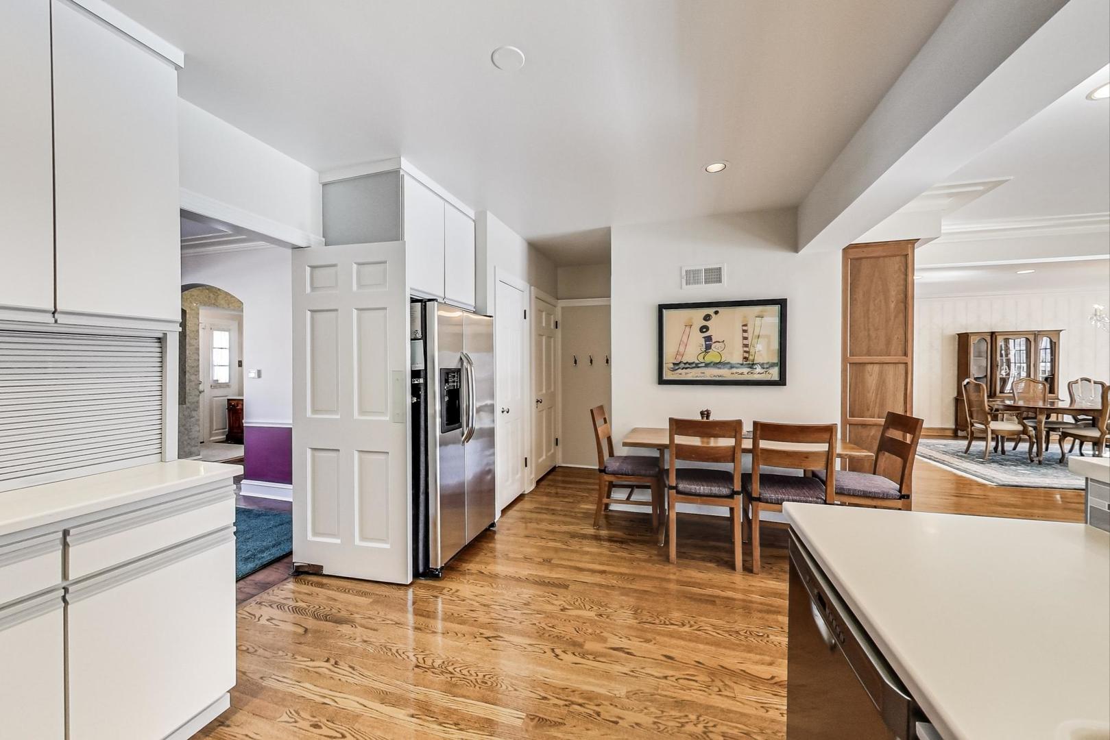 1166 Cherry Street Winnetka, IL 60093 - Photo 13 of 44 a living room with furniture and a kitchen view