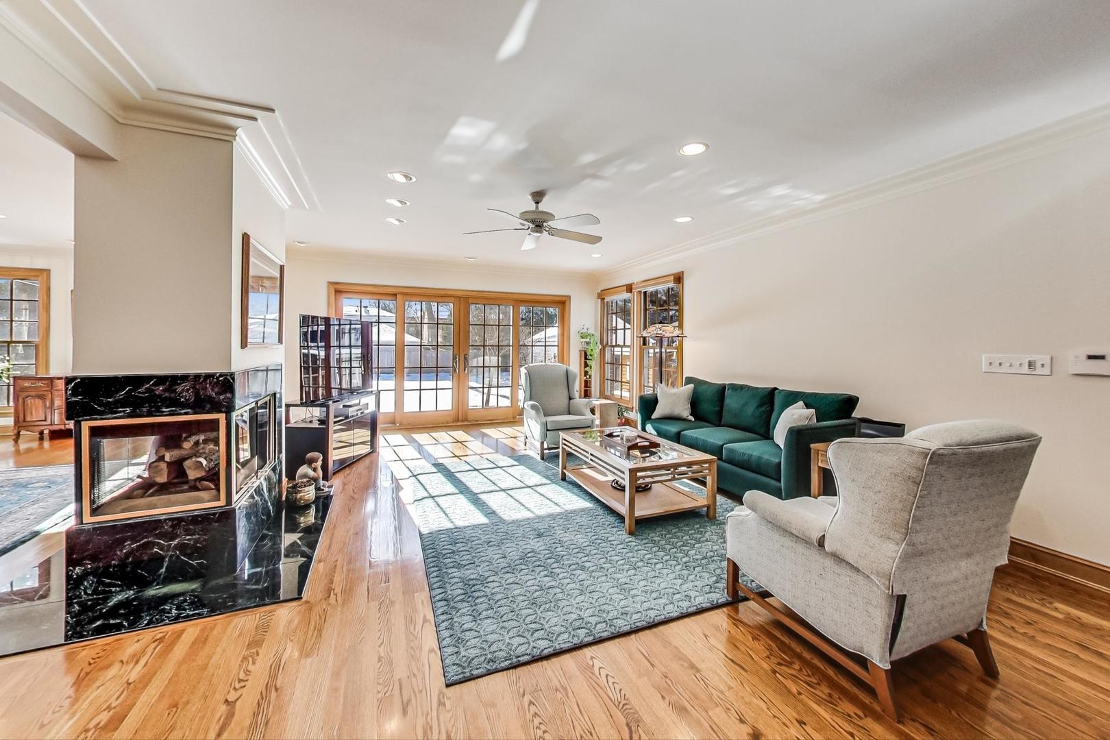 1166 Cherry Street Winnetka, IL 60093 - Photo 14 of 44 a living room with furniture and wooden floor