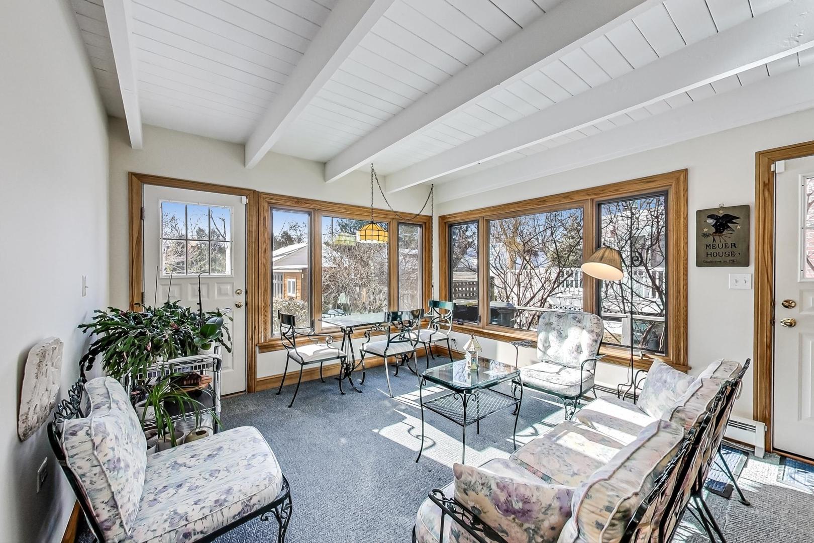 1166 Cherry Street Winnetka, IL 60093 - Photo 18 of 44 a living room with furniture and a large window