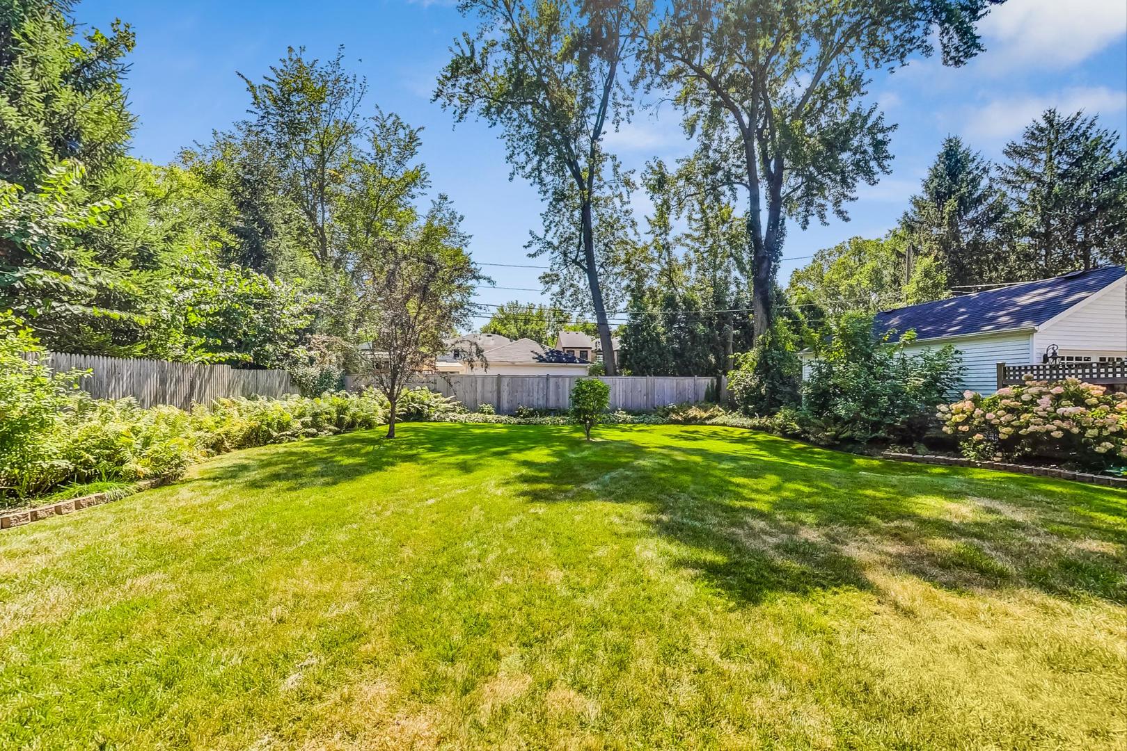 1166 Cherry Street Winnetka, IL 60093 - Photo 40 of 44 a view of yard with swimming pool and green space