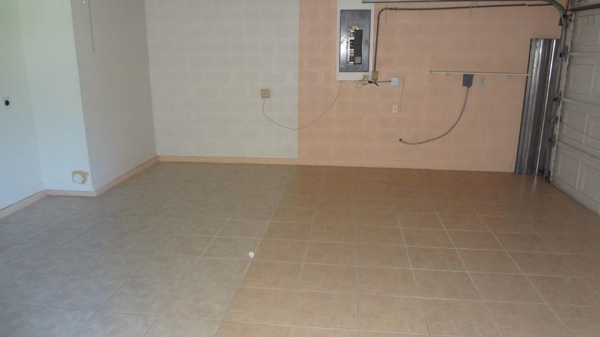 2026 Southwest Certosa Road Port St. Lucie, FL 34953 - Photo 10 of 12 Tiled Garage