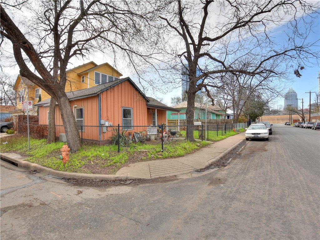 911 East 3rd Street Austin, TX 78702 - Photo 1 of 1 a front view of a house with a garden and tree