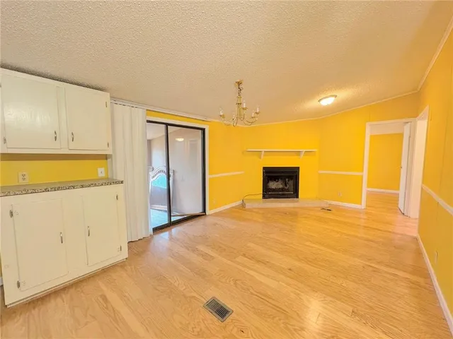 a view of a livingroom with a fireplace