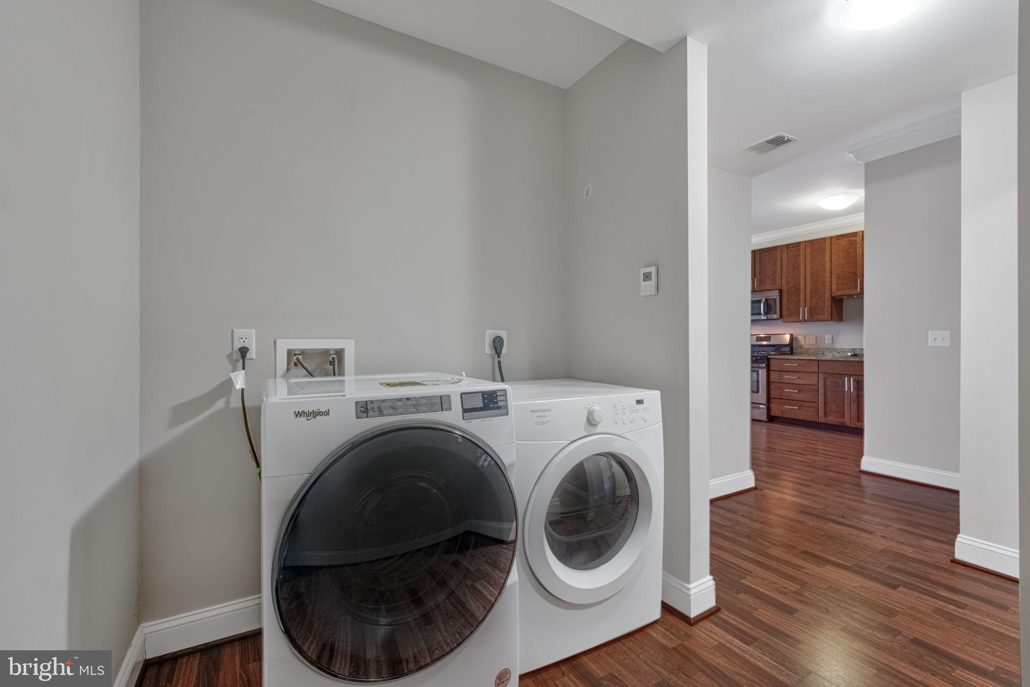 6301 Edsall Road, Unit 418 Alexandria, VA 22312 - Photo 33 of 44 a view of livingroom with washer and dryer