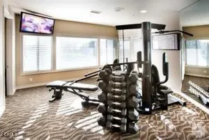 a view of a work place with furniture