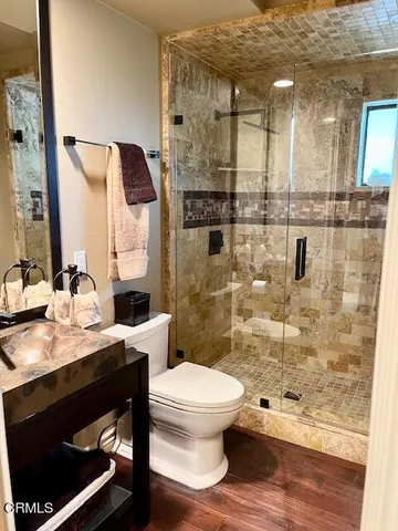 a dining table with chairs and window