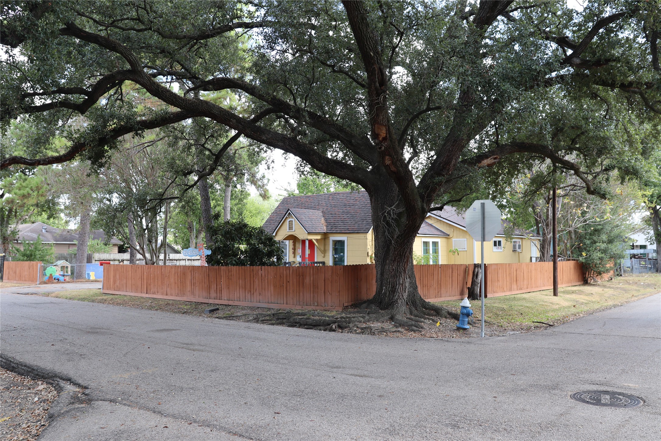 4302 Delhi Street Houston, TX 77022 - Photo 8 of 23 front view of a house with a street