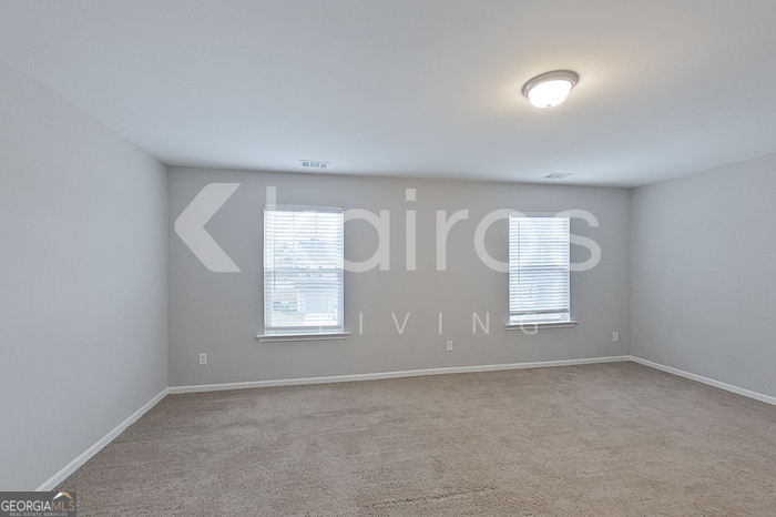 101 St Phillip Way Springfield, GA 31329 - Photo 18 of 25 an empty room with windows and closet