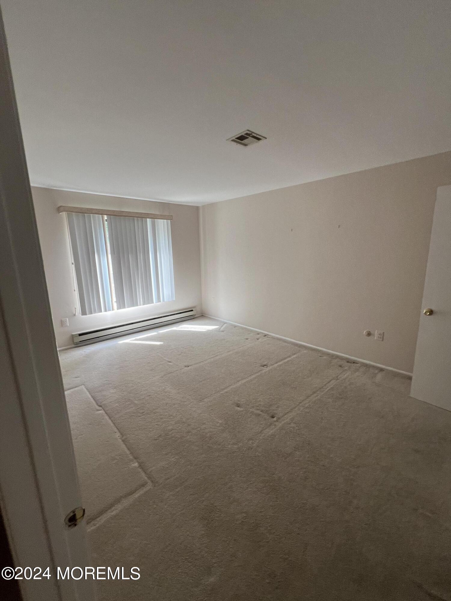 222 Medford Court, Unit E Englishtown, NJ 07726 - Photo 7 of 11 Primary Bedroom