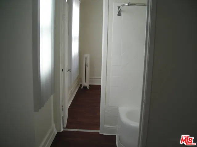 a view of a bathroom from the hallway