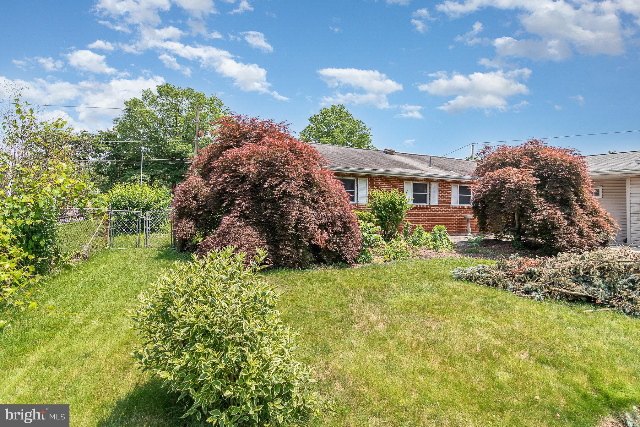 1955 Dawn Road Enola, PA 17025 - Photo 17 of 21 a backyard of a house with lots of green space