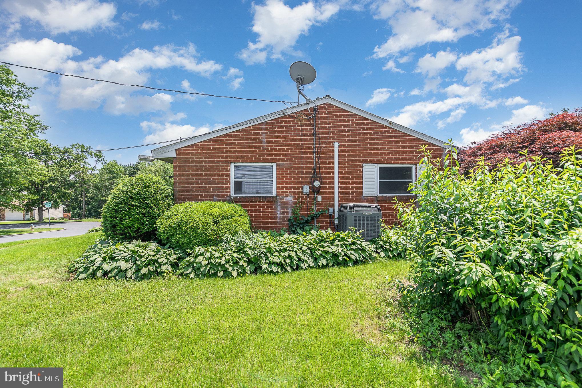 1955 Dawn Road Enola, PA 17025 - Photo 19 of 21 a front view of a house with garden