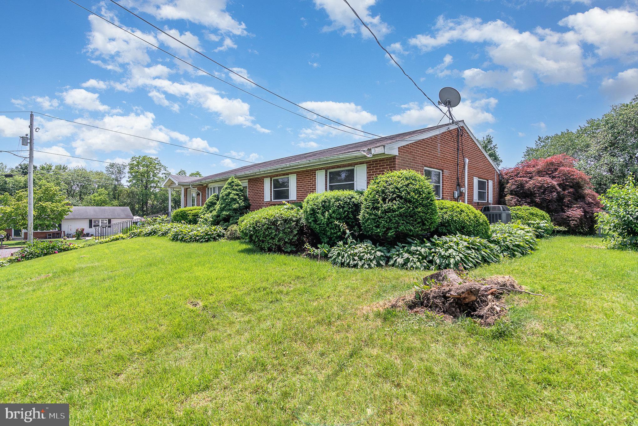 1955 Dawn Road Enola, PA 17025 - Photo 20 of 21 a front view of house with yard and trees