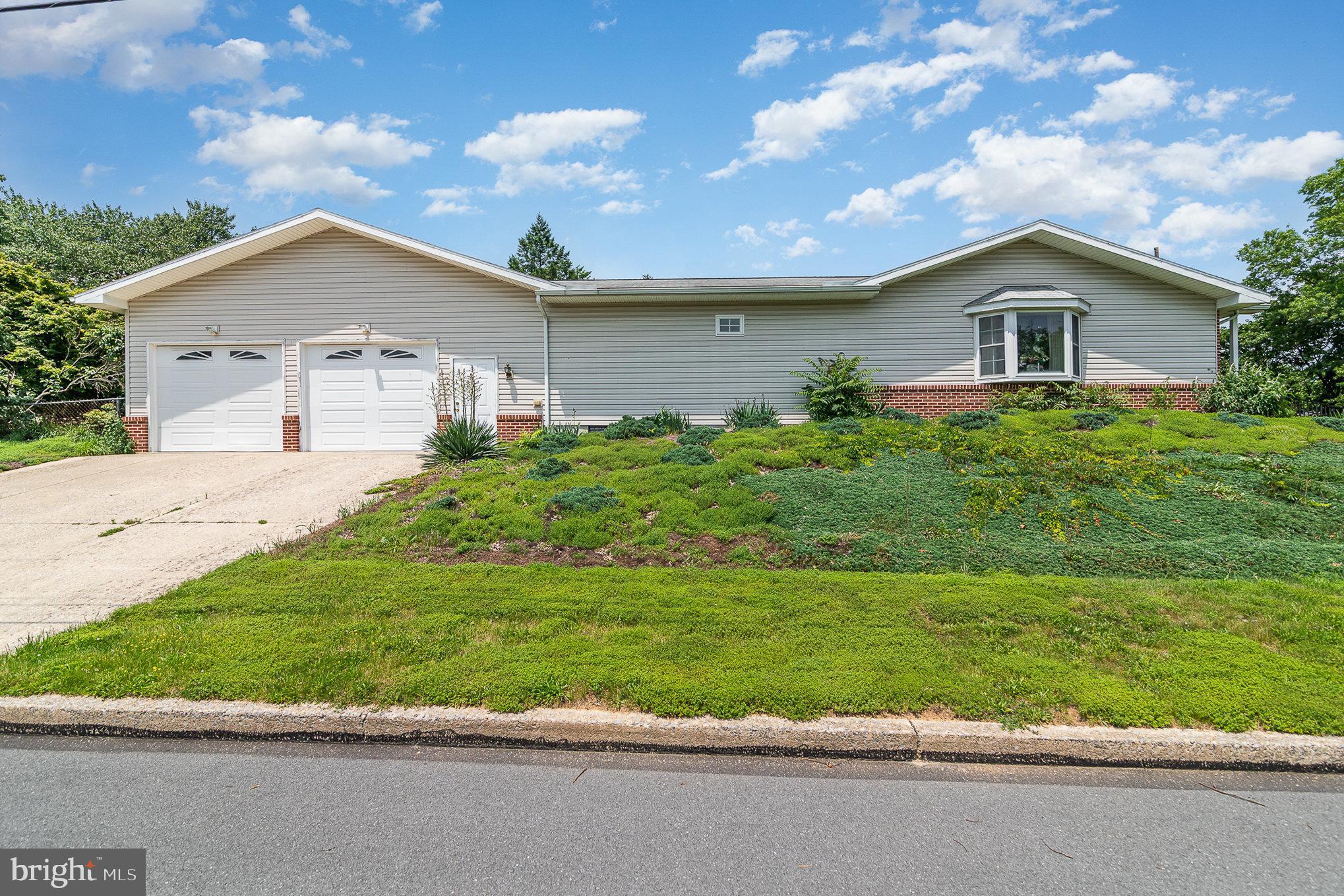 1955 Dawn Road Enola, PA 17025 - Photo 2 of 21 a front view of house with yard and green space
