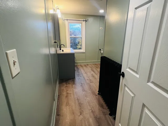 a bathroom with a toilet and a sink