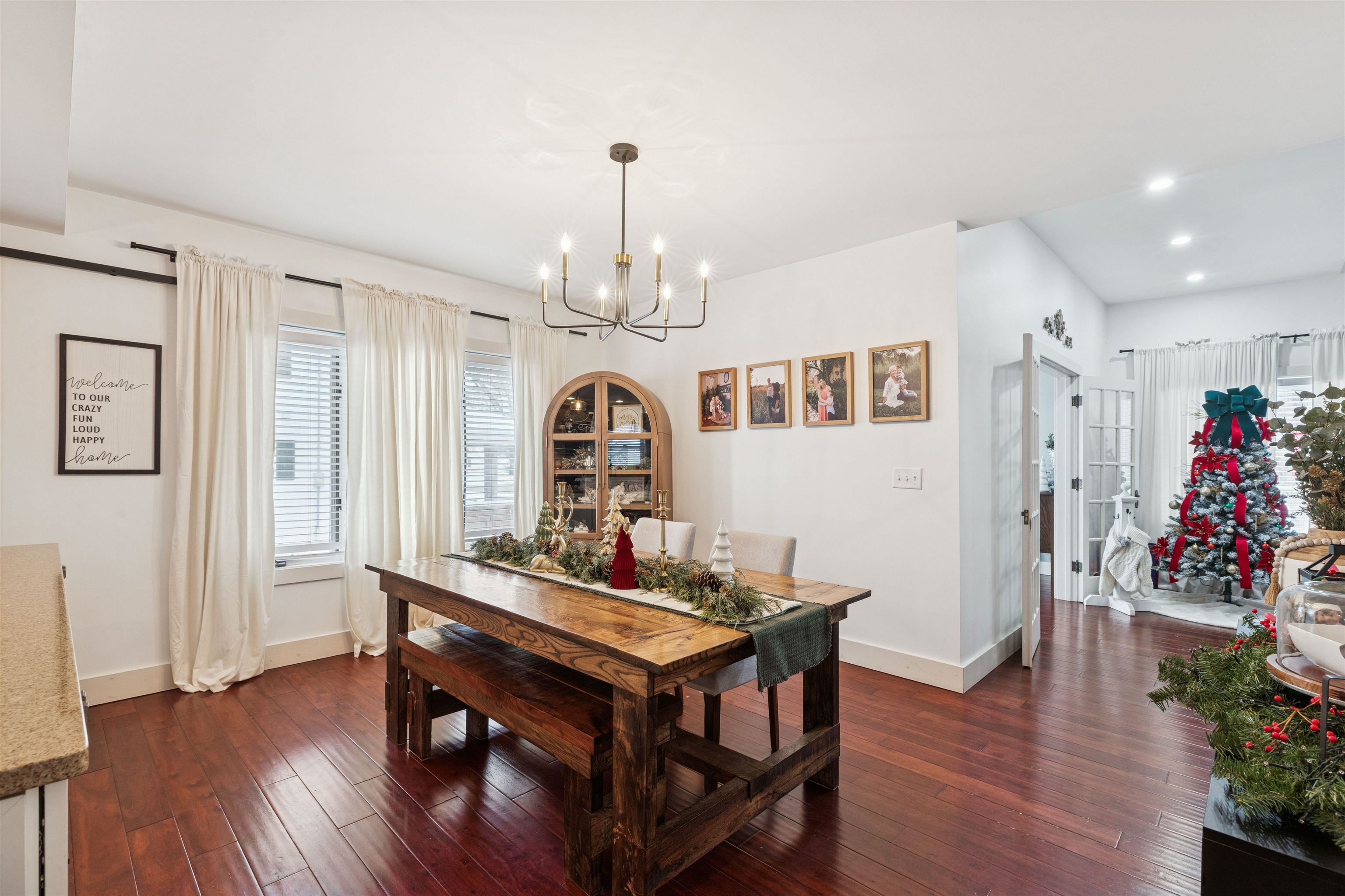 306 North Main Street Alexis, IL 61412 - Photo 19 of 44 a living room with furniture and a chandelier