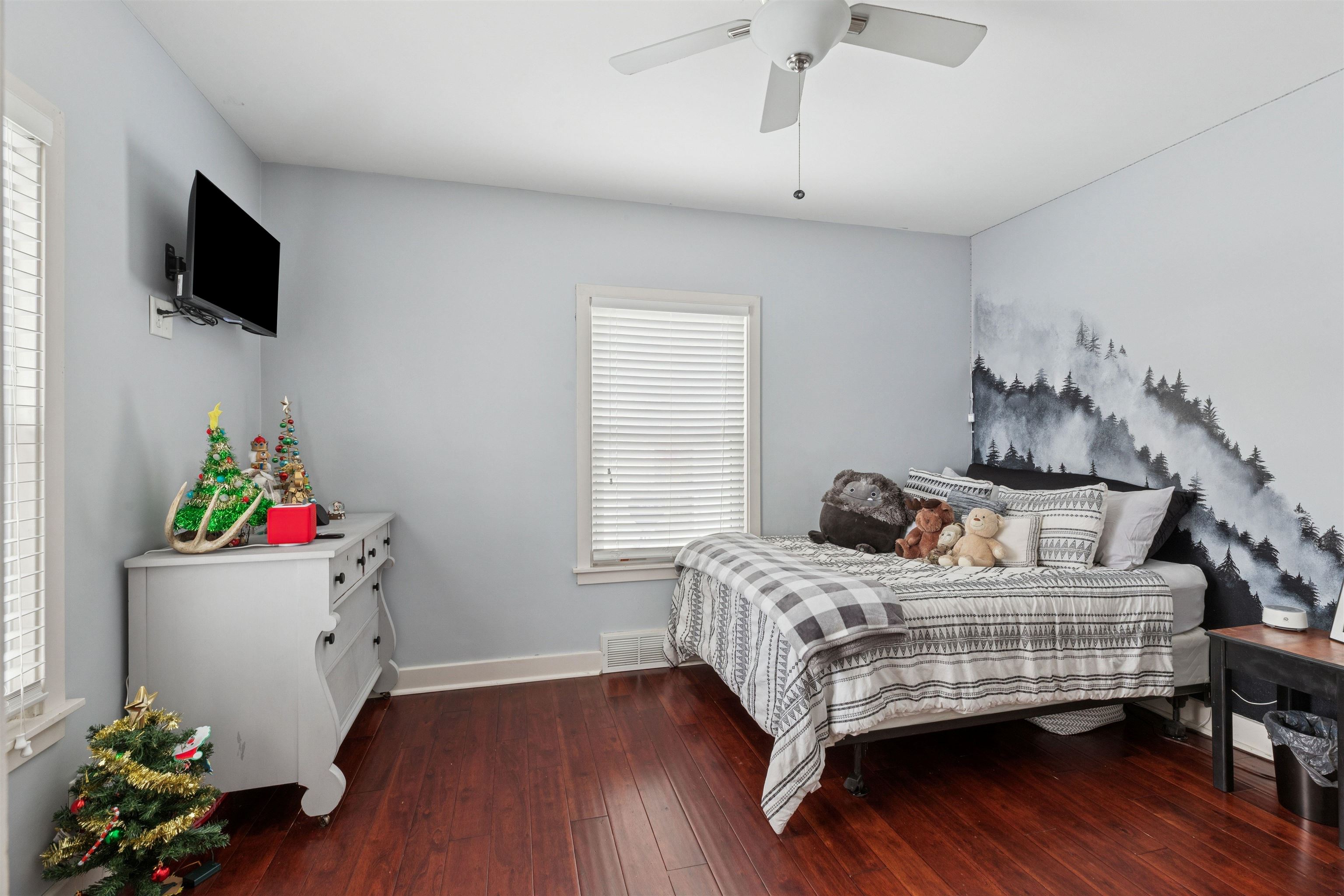 306 North Main Street Alexis, IL 61412 - Photo 31 of 44 a bedroom with a bed and wooden floor