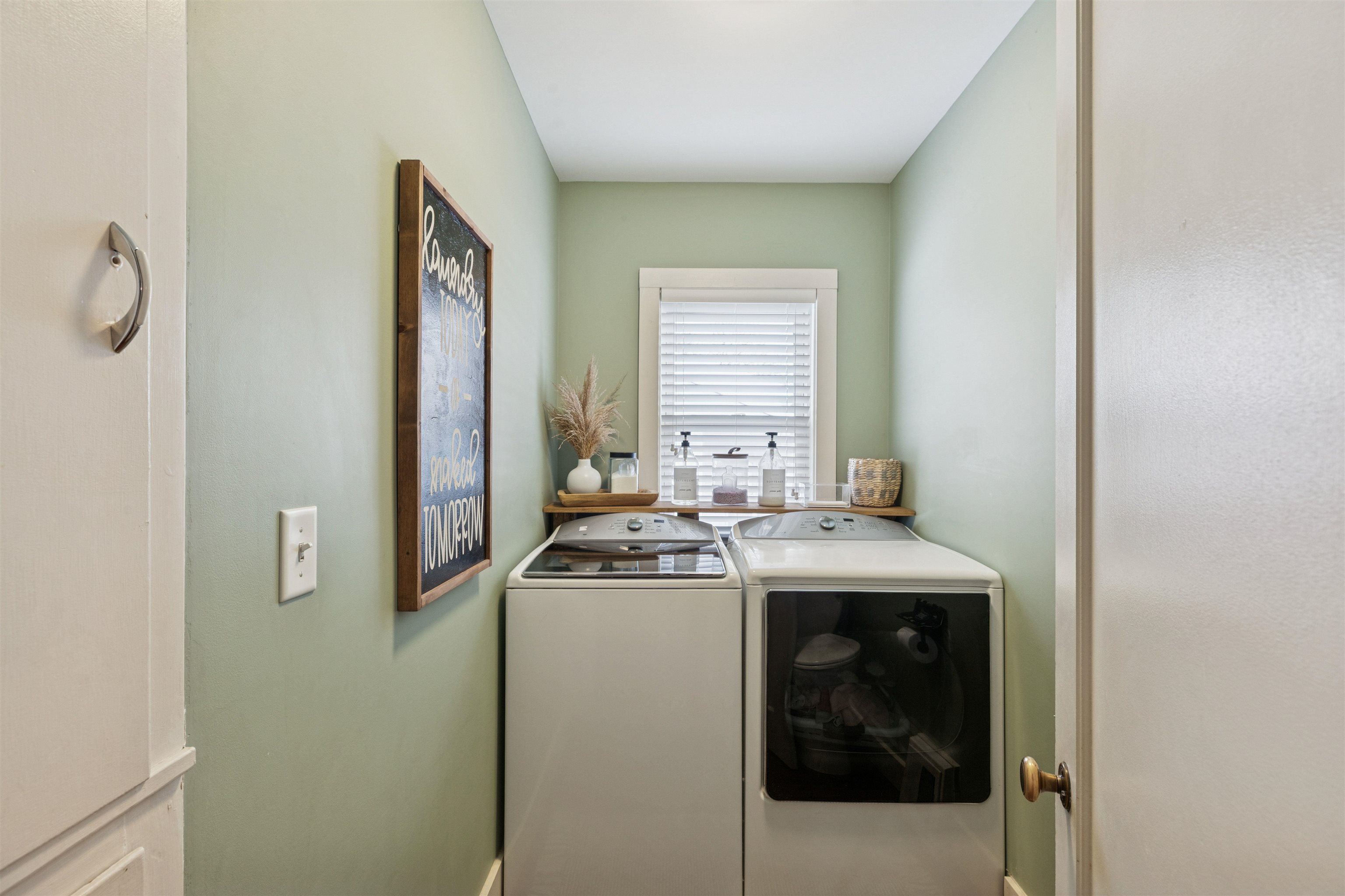 306 North Main Street Alexis, IL 61412 - Photo 33 of 44 a kitchen with a stove and a refrigerator