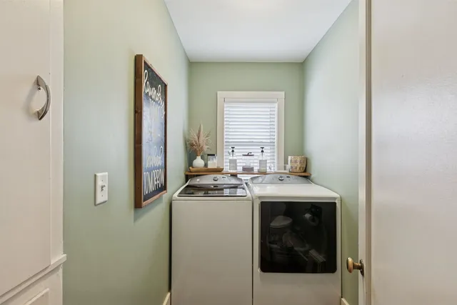 a kitchen with a stove and a refrigerator