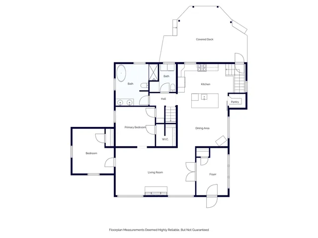 a picture of a bench in front of a building