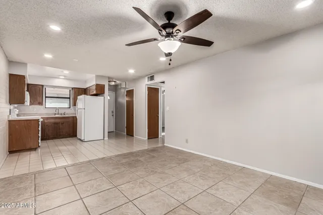 a view of a kitchen with a sink and dishwasher