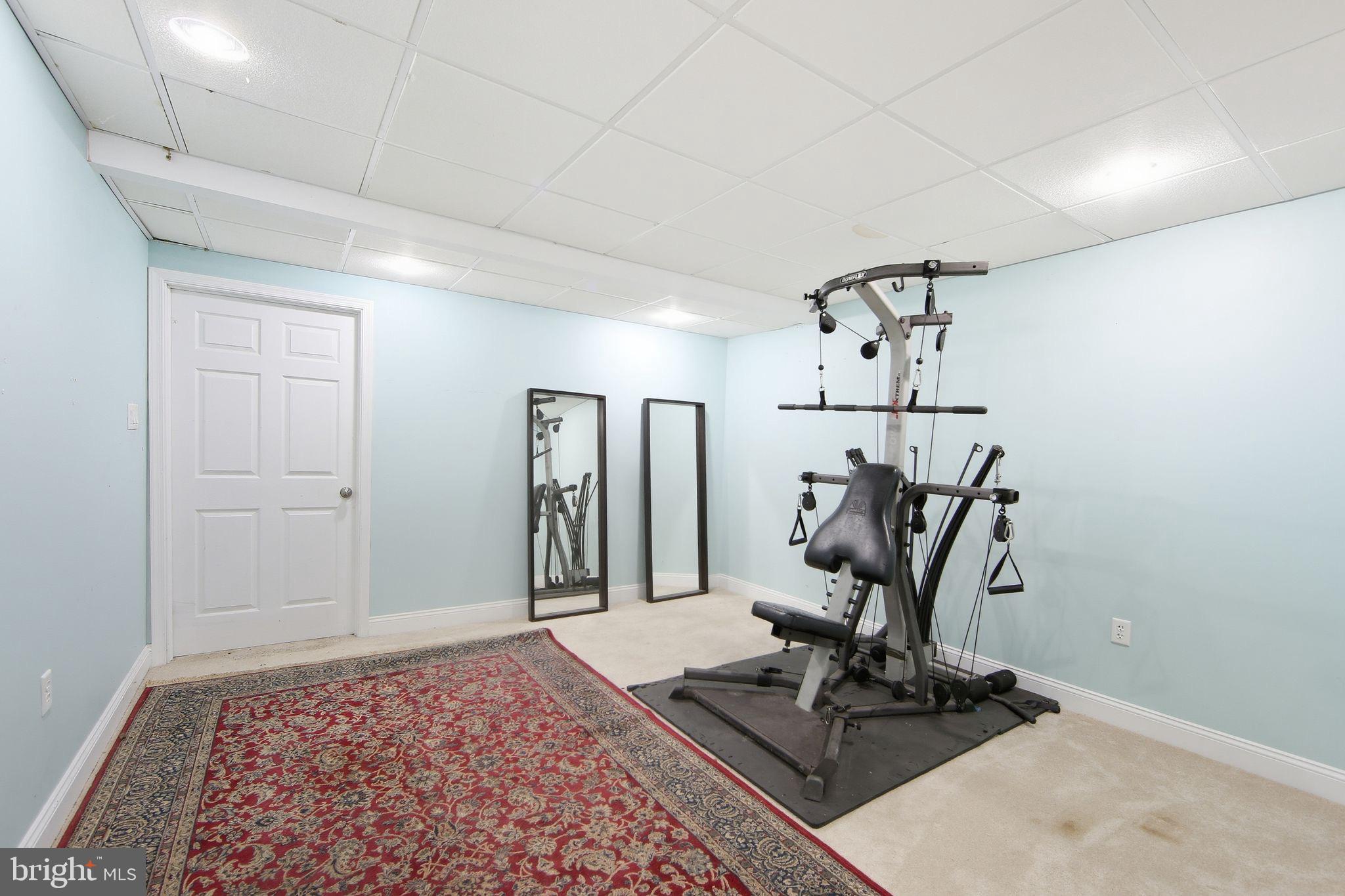 156 Grove Road Elverson, PA 19520 - Photo 30 of 45 a view of a room with gym equipment