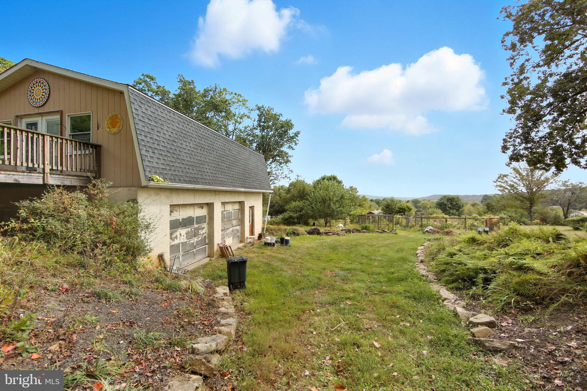 156 Grove Road Elverson, PA 19520 - Photo 34 of 45 a front view of a house with a yard