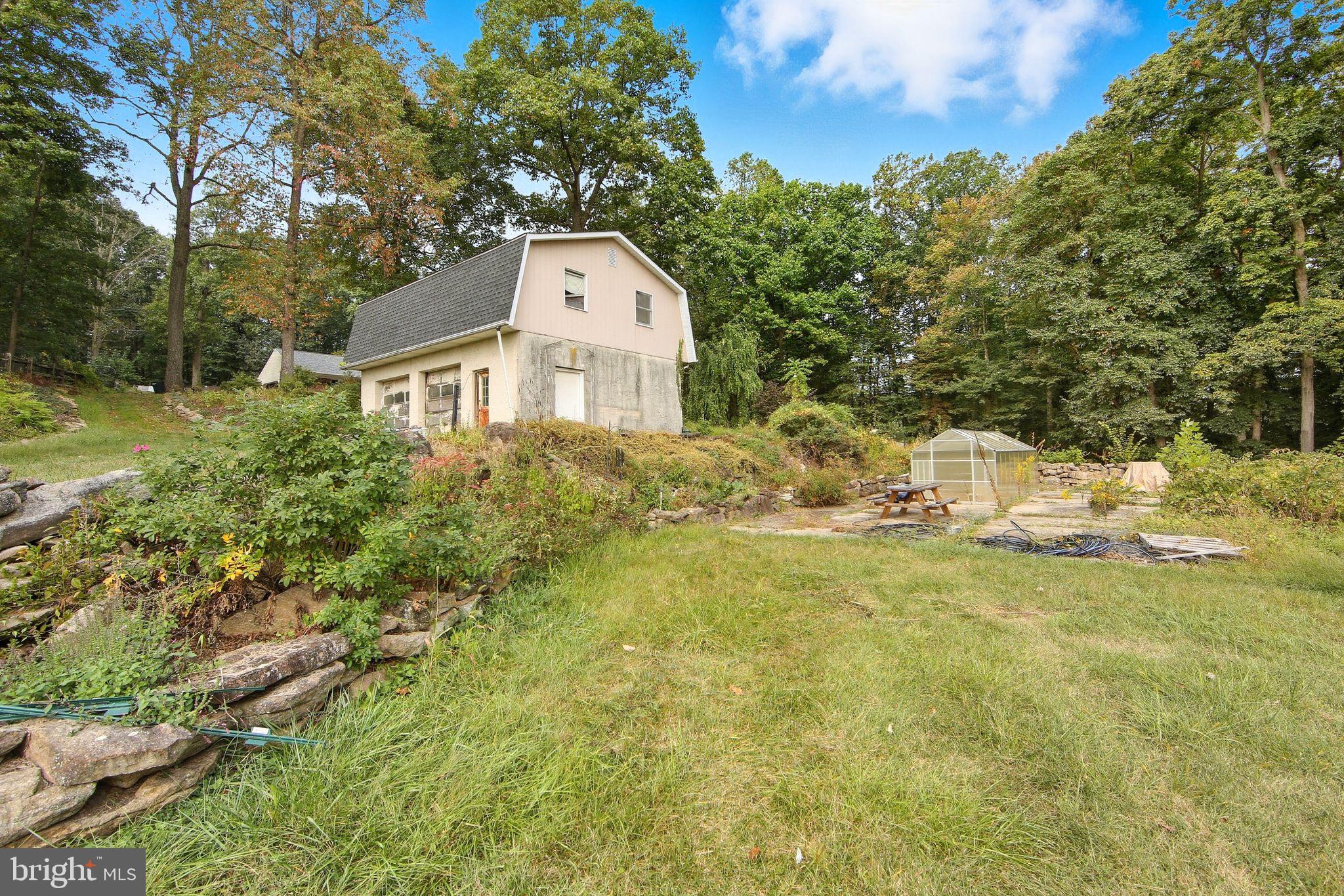 156 Grove Road Elverson, PA 19520 - Photo 37 of 45 a view of a house with a yard