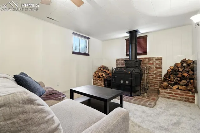 a bedroom with furniture and a closet