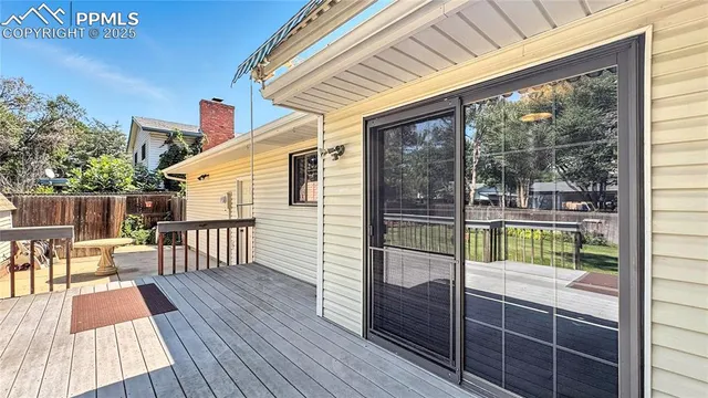 a balcony with wooden floor