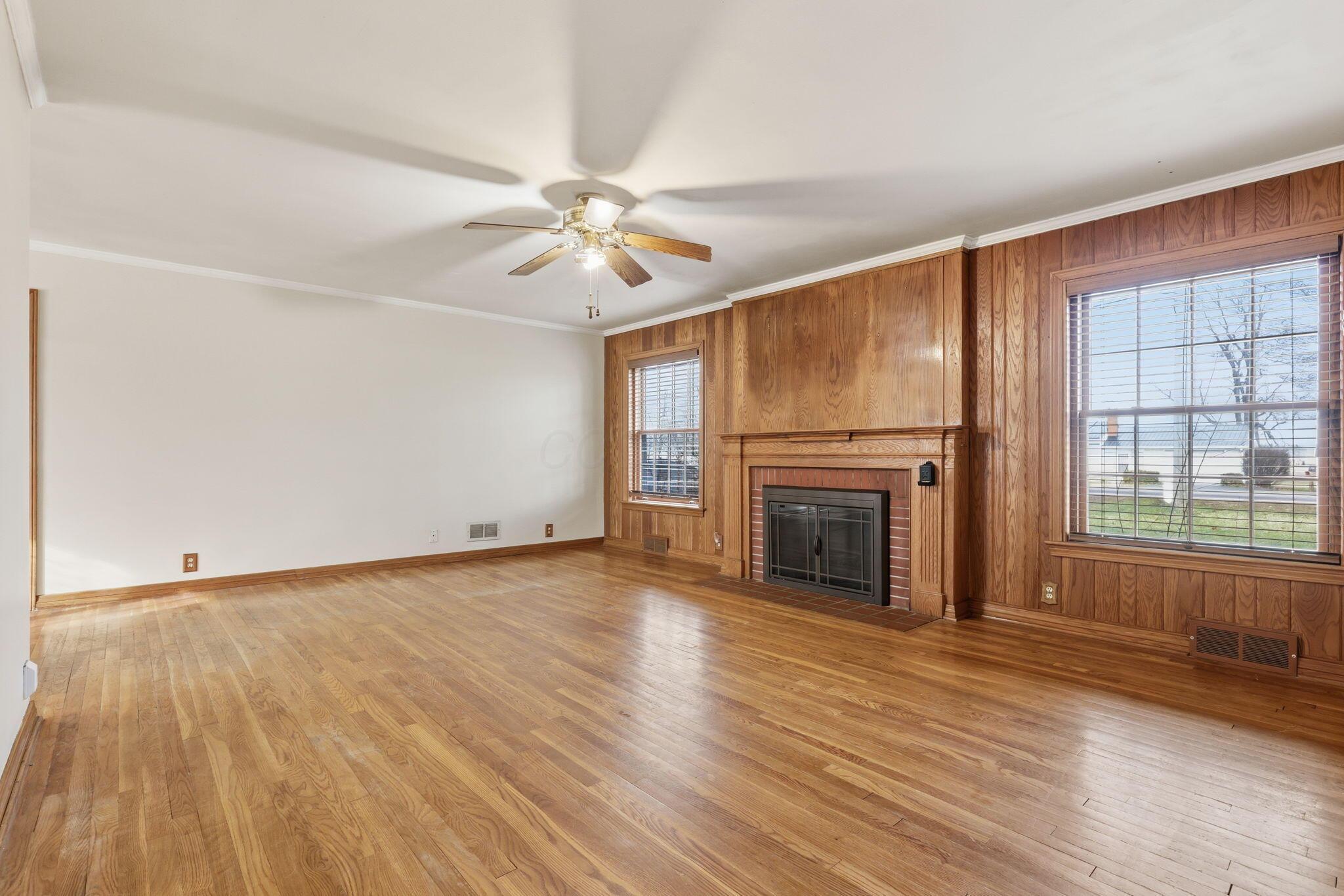 229 Heath Road Heath, OH 43056 - Photo 6 of 35 Living Room with beautiful hardwood floors. wood work, wood burning fireplace