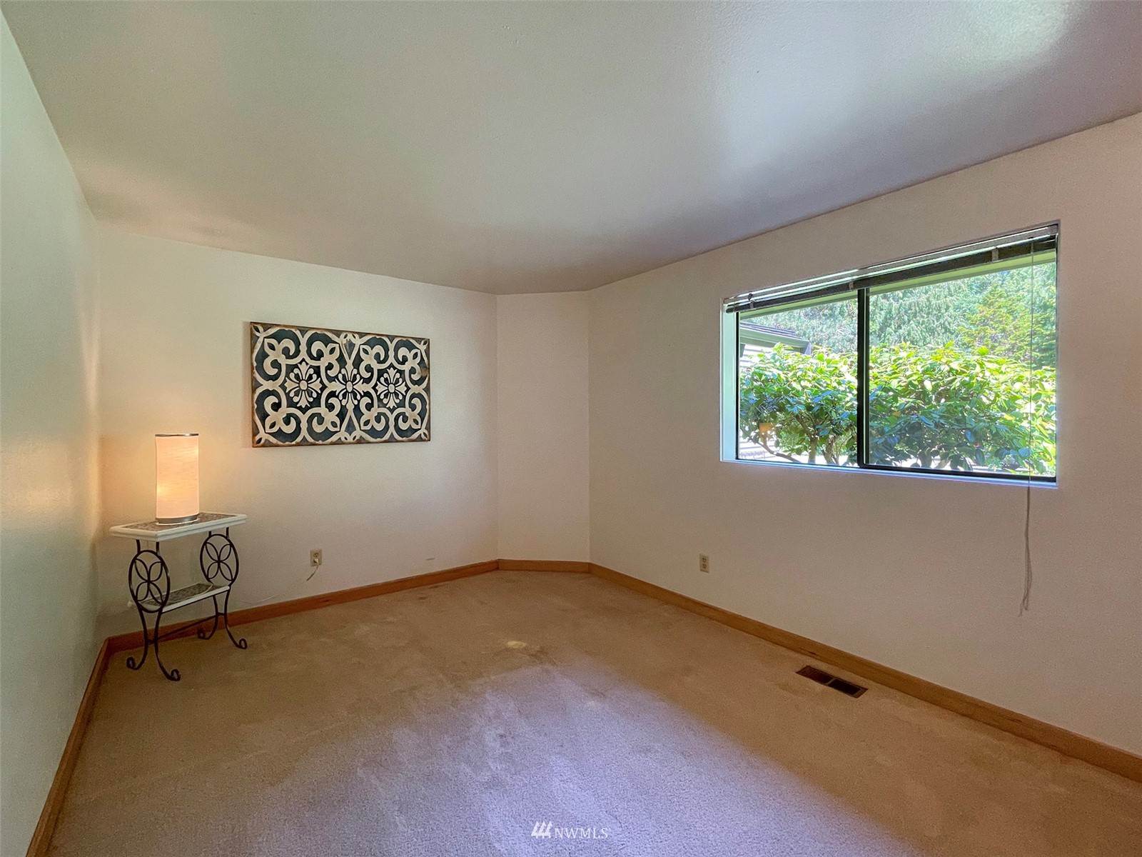 91 West Hidden Ridge Road Sequim, WA 98382 - Photo 20 of 40 an empty room with a window