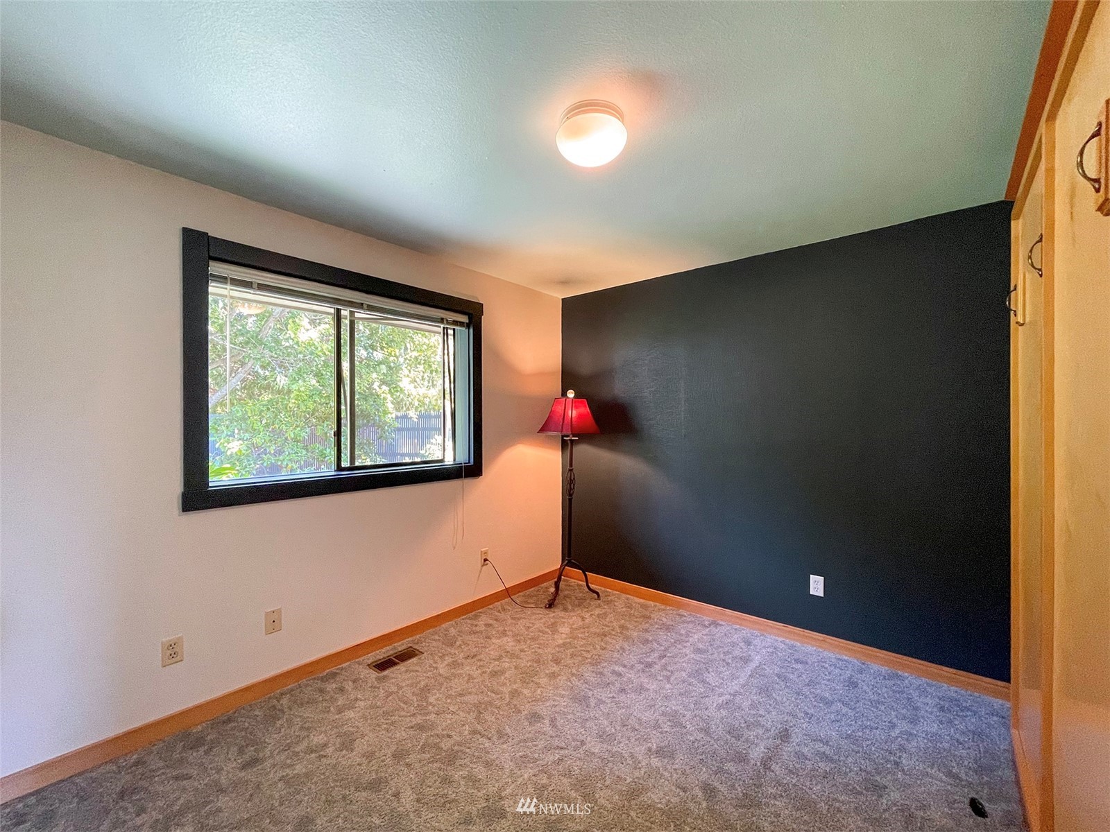 91 West Hidden Ridge Road Sequim, WA 98382 - Photo 22 of 40 an empty room with a window