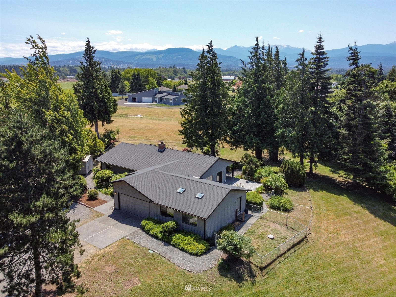 91 West Hidden Ridge Road Sequim, WA 98382 - Photo 38 of 40 an aerial view of a house with yard swimming pool and outdoor seating