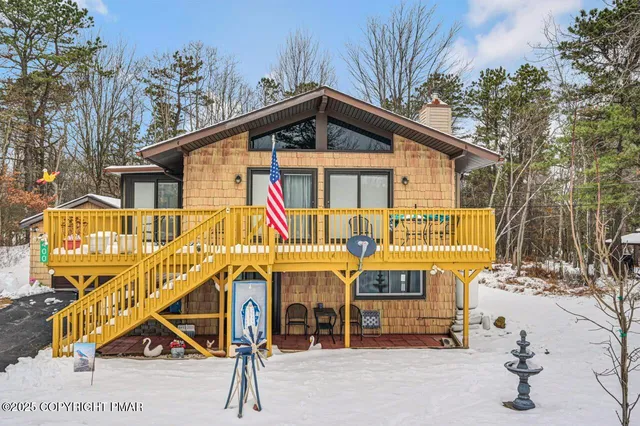 a view of a dinning tables and chairs in patio of the house