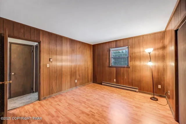 a kitchen with a sink cabinets and appliances