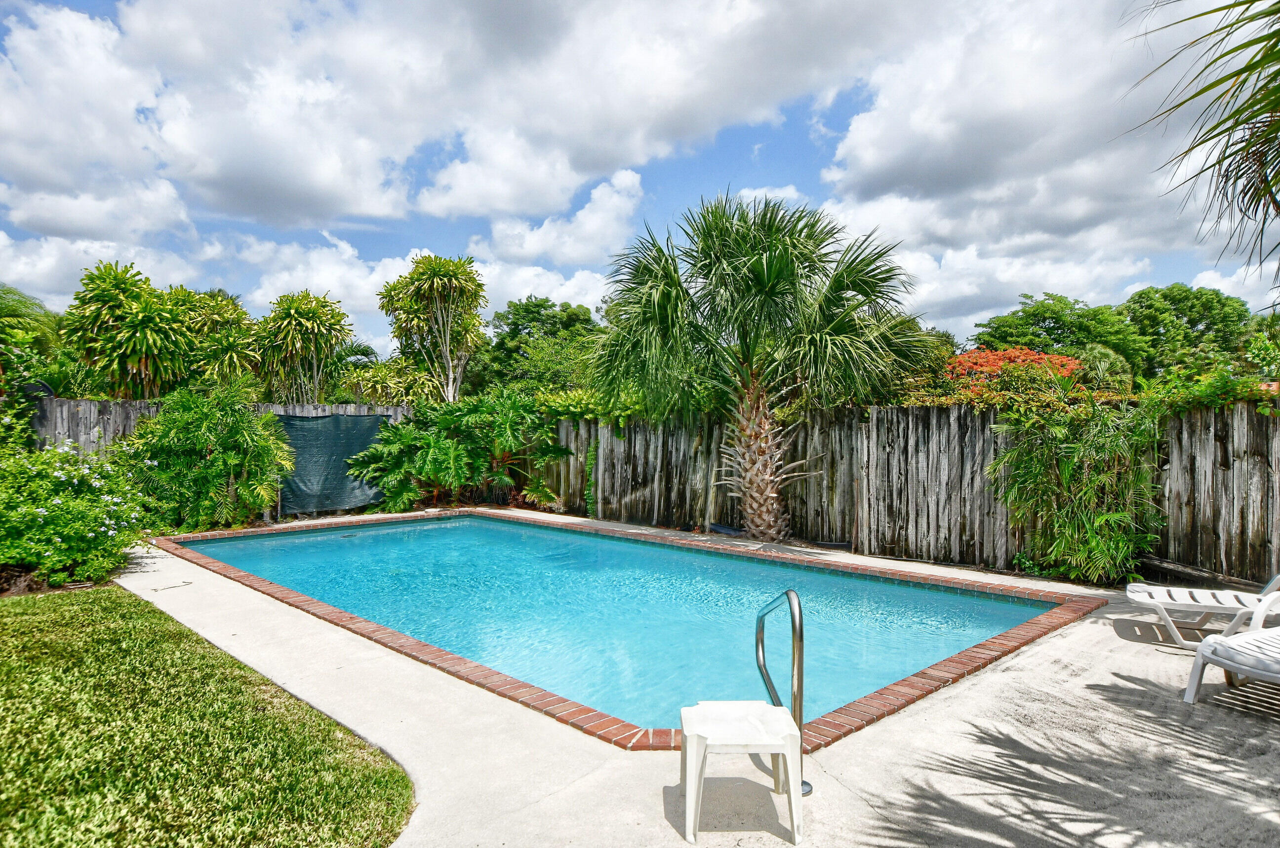 7521 Martinique Boulevard Boca Raton, FL 33433 - Photo 8 of 11 Backyard 3 with pool